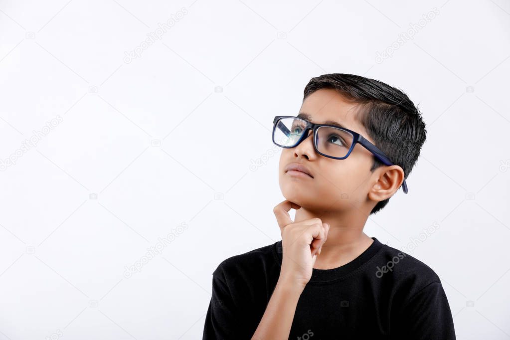 Indian child wearing spectacles and looking seriously