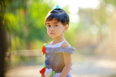 Indian child girl playing in the park