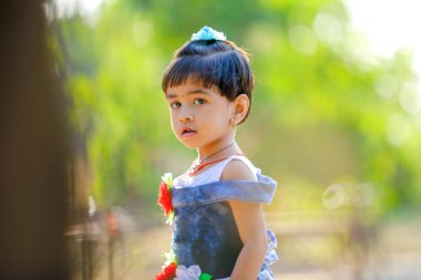Indian child girl playing in the park