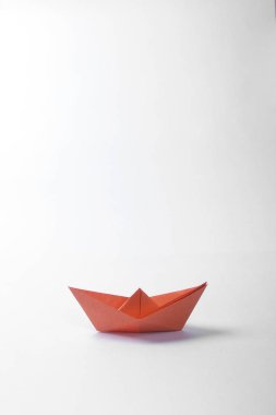 Paper boats over white  background