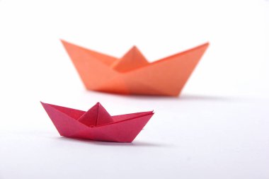 Paper boats over white  background