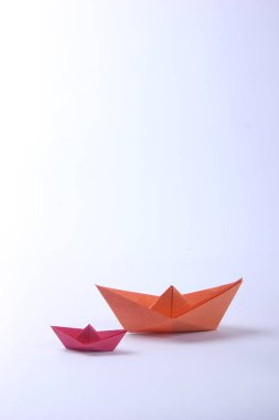 Paper boats over white  background