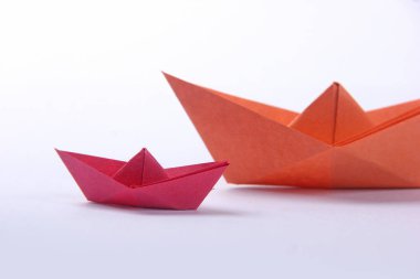 Paper boats over white  background