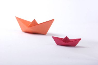 Paper boats over white  background