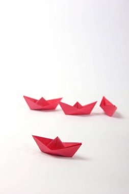 Paper boats over white  background