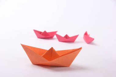 Paper boats over white  background