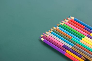 colorful pencil on writing board