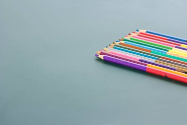colorful pencil on writing board