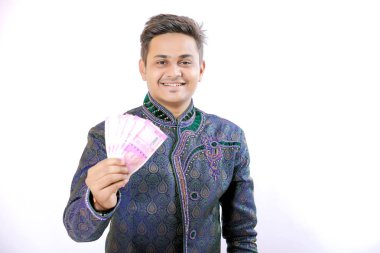 Indian man showing indian currency note