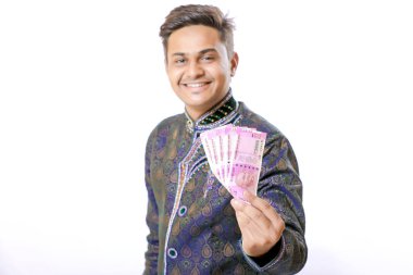 Indian man showing indian currency note