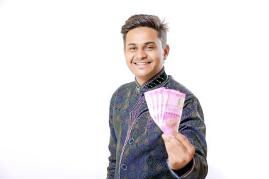 Indian man showing indian currency note