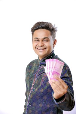 Indian man showing indian currency note