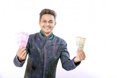 Indian man showing indian currency note