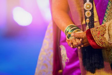 bride and groom hands , indian wedding