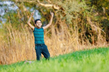 Indian Child Playing in outdoor