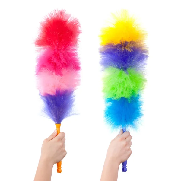 Две разноцветные пылевые щетки — стоковое фото