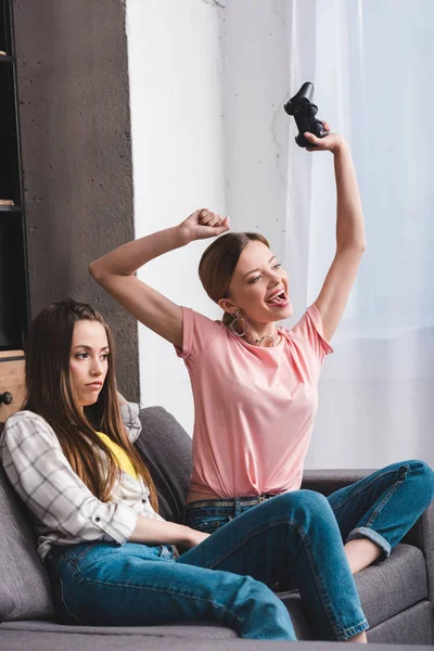 Young Woman Joystick Celebrating Victory Video Game Her Upset Female — Stock Photo, Image