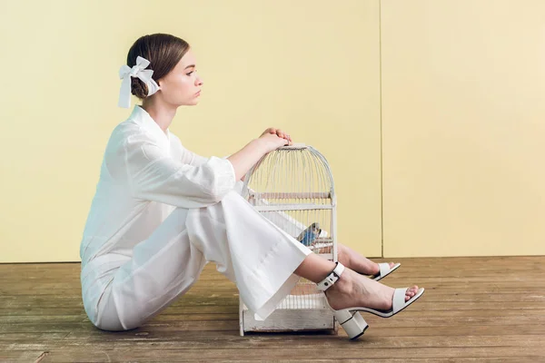 Fashionable Girl White Bird Cage Sitting Floor Yellow — Stock Photo, Image