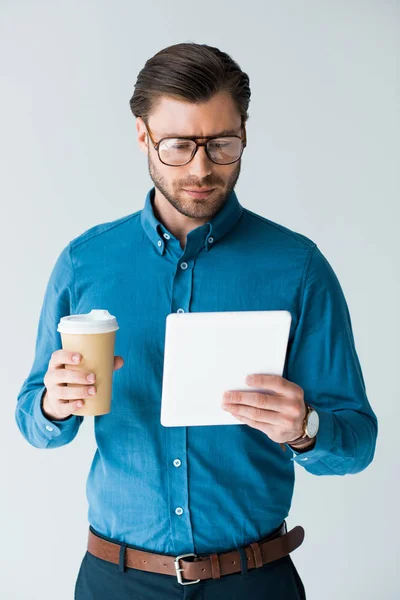 Focused Young Man Paper Cup Coffee Using Tablet Isolated White — Stock Photo, Image