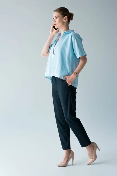 Beautiful Young Woman Blue Shirt Talking Phone Grey — Stock Photo, Image