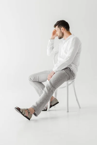 Side View Thoughtful Man Linen Clothes Sitting Chair Isolated Grey — Stock Photo, Image