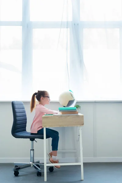 Side View Little Schoolgirl Studying Books Laptop Home — Stock Photo, Image