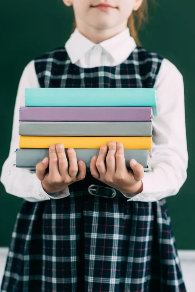 Cropped Shot Cute Little Schoolgirl Holding Pile Books — Free Stock Photo