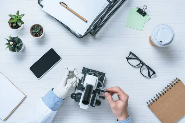 Cropped Shot Male Scientist Prosthetic Arm Using Microscope Table — Stock Photo, Image