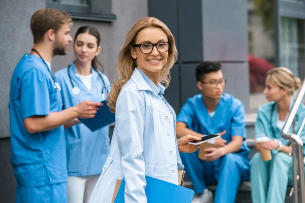 Smiling Teacher Looking Camera Multicultural Students Talking Medical University — Stock Photo, Image