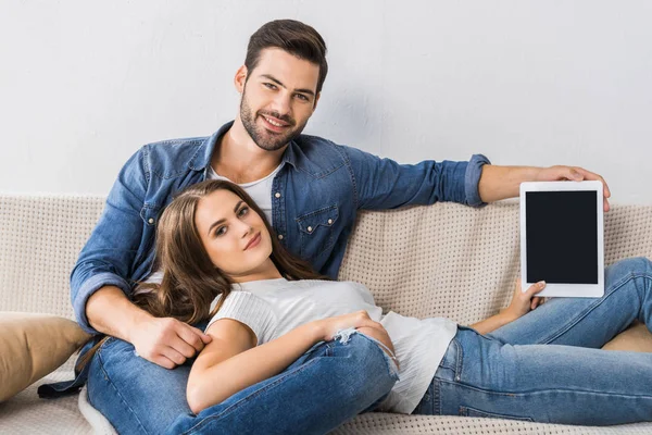 Smiling Woman Showing Digital Tablet Blank Screen While Her Boyfriend — Stock Photo, Image