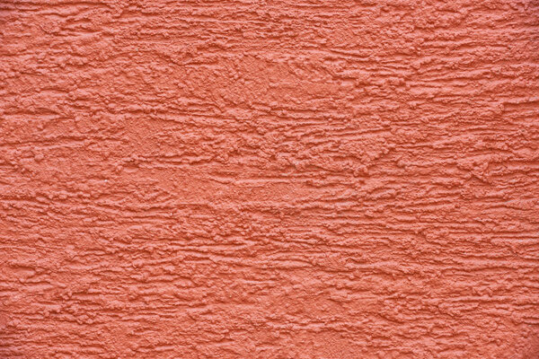 close-up view of red concrete wall textured background 