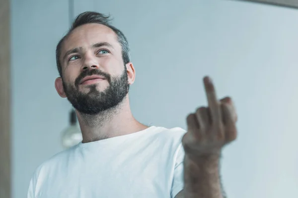 Low Angle View Bearded Man Giving Finger Looking Mirror — Free Stock Photo