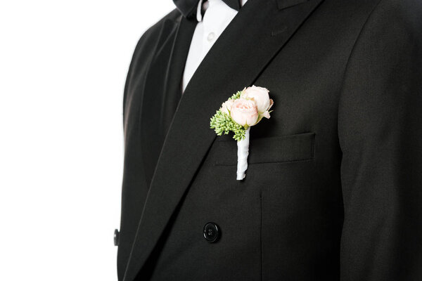 cropped shot of groom in stylish suit with beautiful boutonniere isolated on white