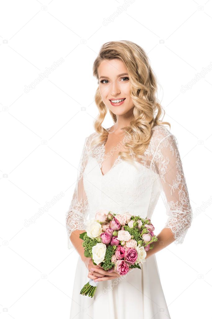 attractive young bride with bouquet looking at camera isolated on white