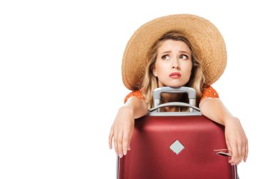 exhausted beautiful leaning on travel bag and looking up isolated on white clipart