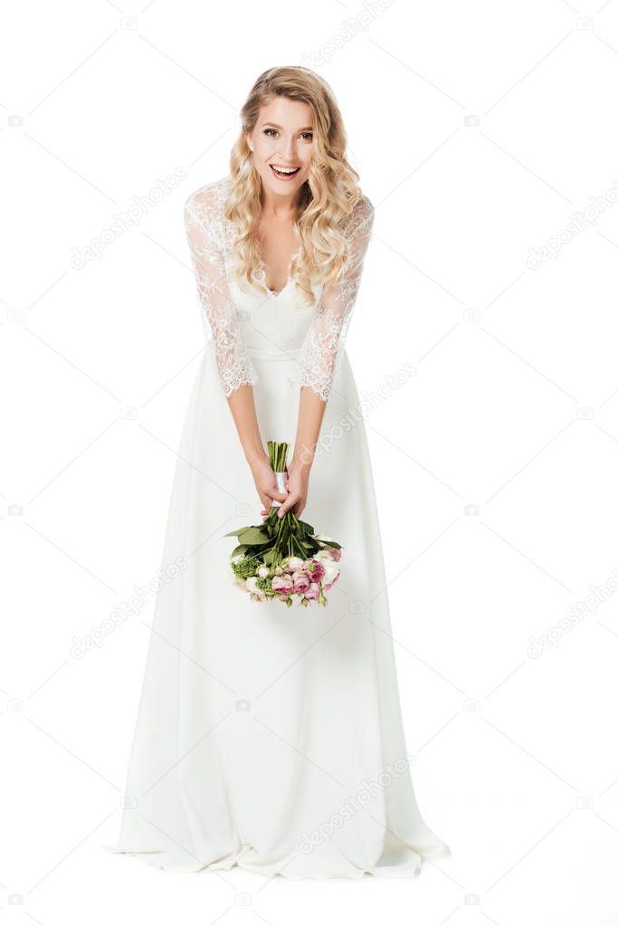 smiling young bride reading to throw bridal bouquet isolated on white