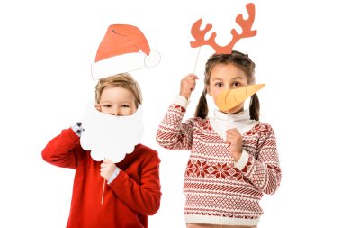 cute little kids with christmas masks isolated on white clipart