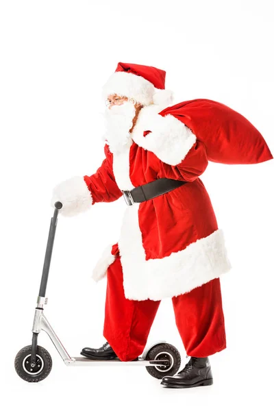 Vista Lateral Santa Claus Com Saco Equitação Scooter Isolado Branco — Fotografia de Stock