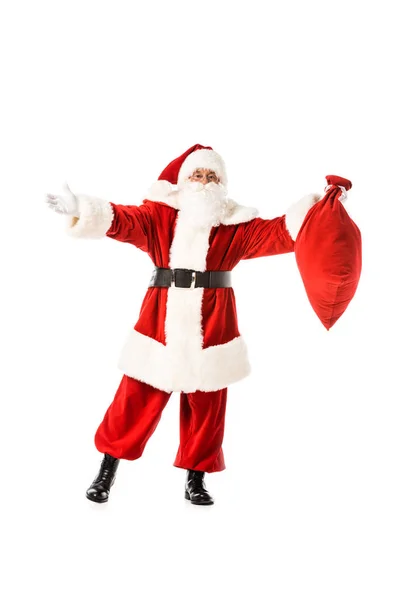 圣诞老人张开双臂抱着麻袋在白色隔离 — 图库照片