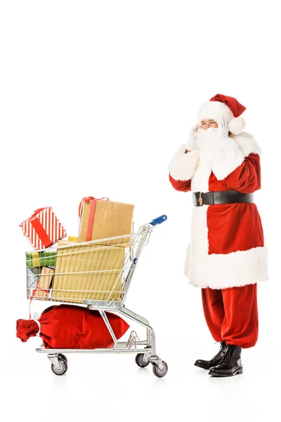 Boční Pohled Santa Claus Nákupním Vozíkem Plným Dárkových Krabiček Uhýbaje — Stock fotografie