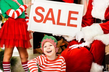 elf kostüm ve satışı büyük başlığı, holding santa shot fo çocuklarda copped Noel alışveriş