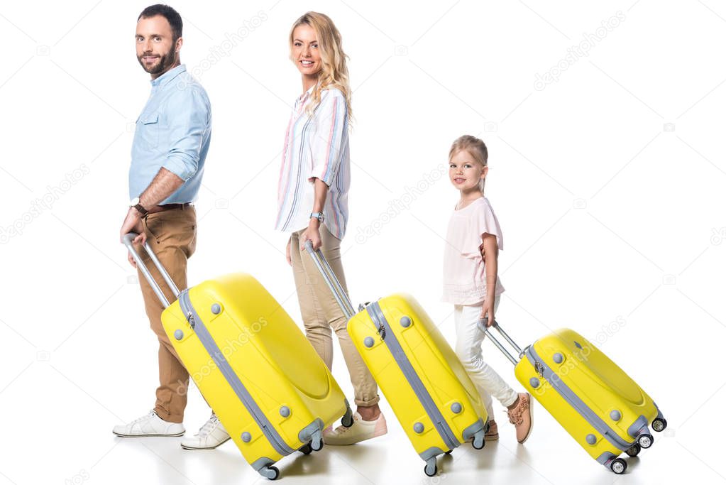 side view of family with yellow travel bags isolated on white