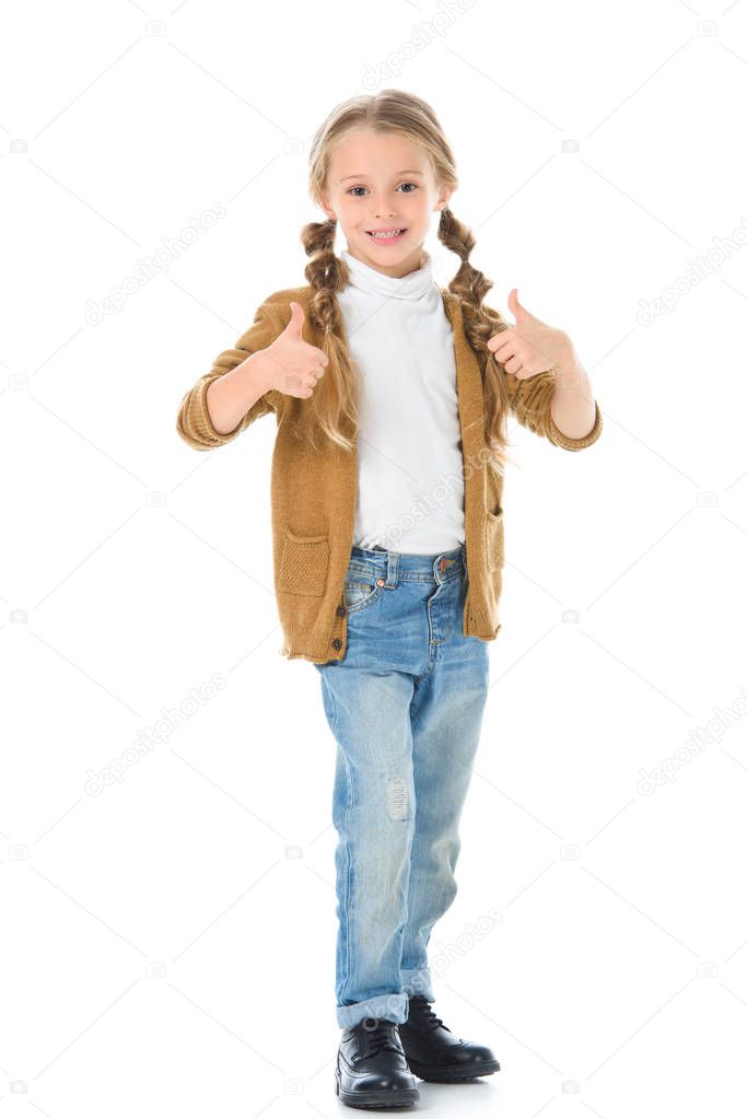 child in autumn outfit showing thumbs up, isolated on white