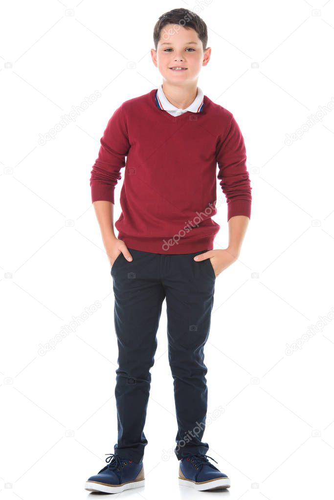 smiling preteen boy posing in casual clothes isolated on white