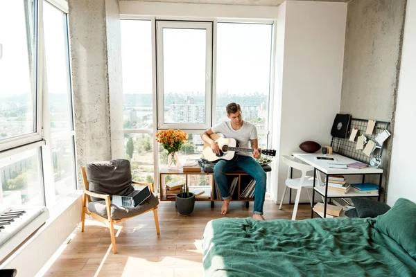 Young Man Playing Acoustic Guitar Home — Free Stock Photo