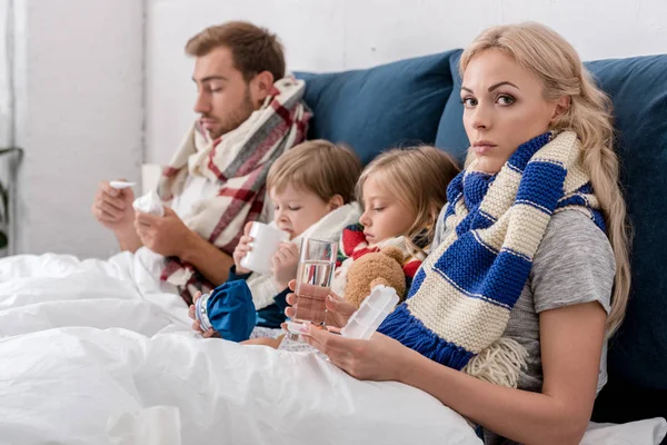 Diseased Young Family Sitting Bed Together Various Treatment Methods — Stock Photo, Image