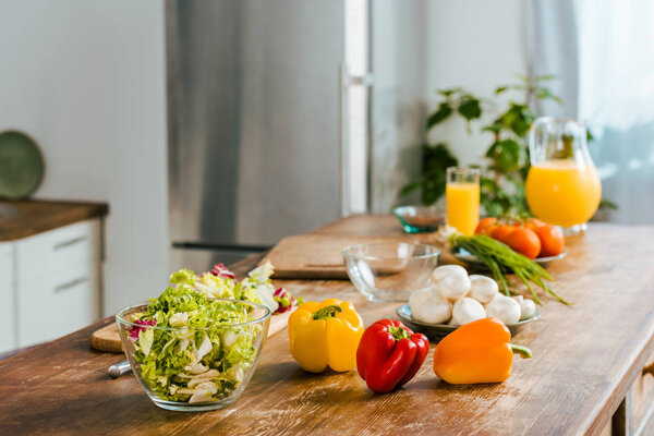 close-up shot of various raw vegetables on table at modern kitchen