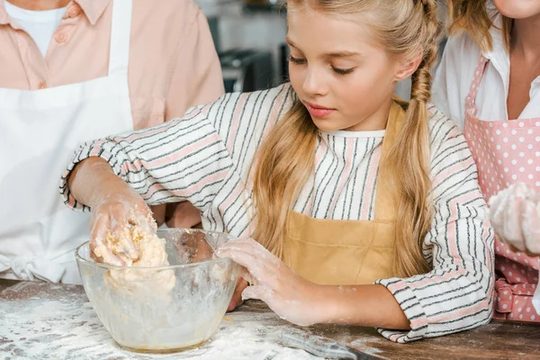 Cropped Shot Concentrated Little Child Making Dough Parents Home — Free Stock Photo