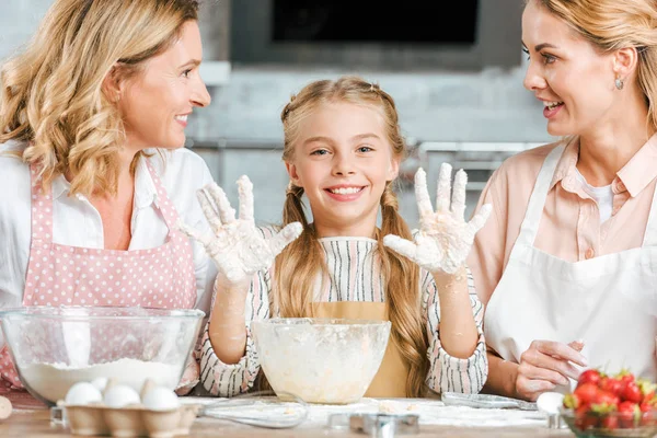 Beautiful Little Child Making Dough Mother Grandmother Home Looking Camera — Stock Photo, Image