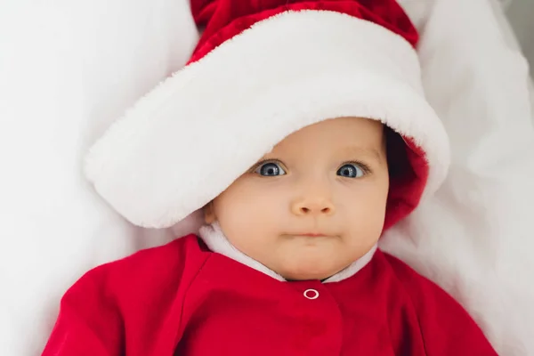 Close Portrait Adorable Little Baby Santa Suit Lying Bed Looking — Stock Photo, Image